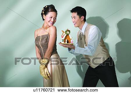 Stock Image - Surprise, Button Down Shirt, Smiling, Young Adult, Waistcoat, Togetherness. Fotosearch