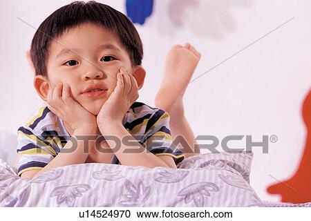 Stock Image - asian ethnicity, bedroom, bed room, 5-6 years. Fotosearch