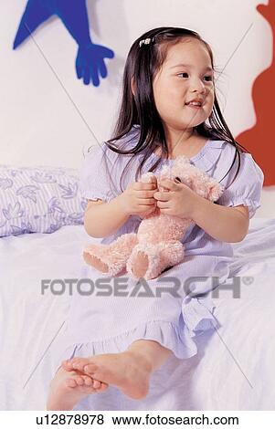 Stock Photo - asian ethnicity, bedroom, bed room, 5-6 years. Fotosearch