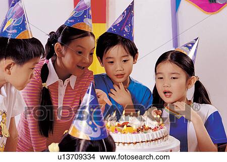 birthday cake, 7-8 years, playful, friendship, group of people, children, asian ethnicity View Large Photo Image Picture - birthday cake, 7-8 years, playful, friendship, group of people, children, asian ethnicity. Fotosearch