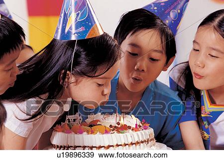 , blowing, asian ethnicity, candles, culture, 7-8 years View Large Photo Image Stock Photo - , blowing, asian ethnicity, candles, culture, 7-8 years. Fotosearch