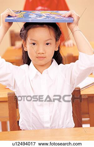 classroom, balancing, hands in air, children, indoor, book on head View Large Photo Image Stock Photo - classroom, balancing, hands in air, children, indoor, book on head. Fotosearch