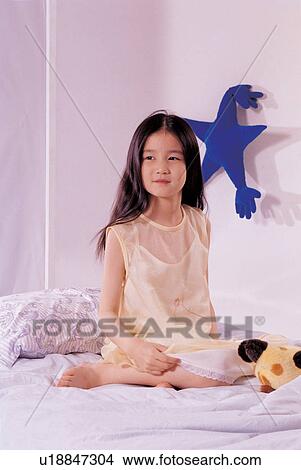 culture, asian ethnicity, bed room, playful, lifestyle View Large Photo Image Picture - culture, asian ethnicity, bed room, playful, lifestyle. Fotosearch