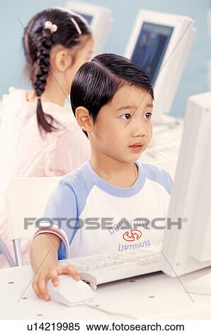 Stock Photography - screen, young, technology, playful, childhood, studying, lifestyle. Fotosearch