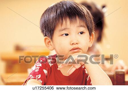 Stock Photograph - sitting, lifestyle, young, culture, education. Fotosearch