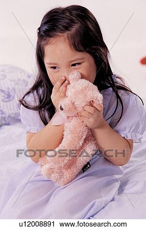 young, looking down, hand on mouth, care, covering, culture View Large Photo Image Stock Image - young, looking down, hand on mouth, care, covering, culture. Fotosearch