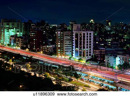 Stock Photo - Bright, Building, Building Exterior, Building Structure, Car, City, Cityscape. Fotosearch