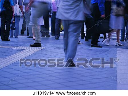 Picture - transportation, hour, people, city, walking. Fotosearch
