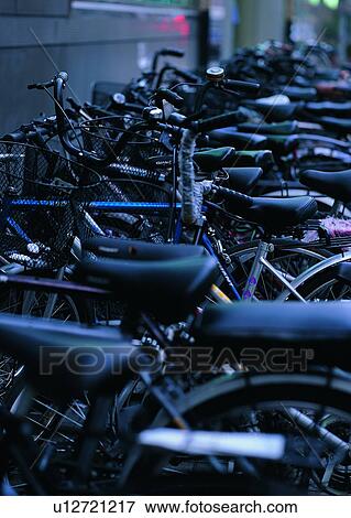 Stock Photo - transportation, parking, bike, rush, hour. Fotosearch