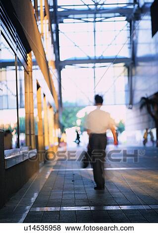 Stock Photo - walking, hour, transportation, city, building, rush. Fotosearch