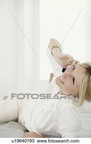 Woman on phone. View Large Photo Image Stock Image - Woman on phone.. Fotosearch