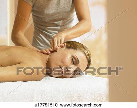 Woman receiving a luxury massage View Large Photo Image Stock Image - Woman receiving a luxury massage. Fotosearch