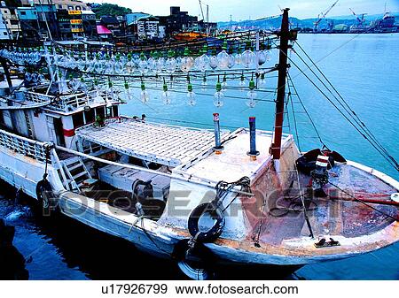Stock Photo - bulb, boat, coast, town, building, ocean, sea. Fotosearch