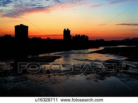 Stock Image - scenery, ocean, building, sky, sea, coast, city. Fotosearch