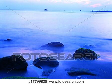 Stock Photography - scenery, sea, ocean, coast, rock, boat. Fotosearch
