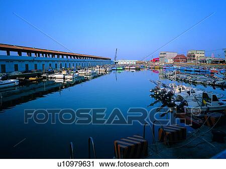 Stock Image - sky, wall, scenery, building, boat, ocean, reflection. Fotosearch