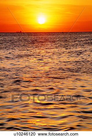 sun, ship, sunset, ocean, coast, sky View Large Photo Image Stock Image - sun, ship, sunset, ocean, coast, sky. Fotosearch