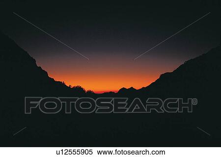 Stock Photography - Orange, Landscape, Moody Sky, Seasons, Silhouette, Dusk. Fotosearch