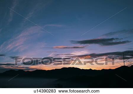 Stock Image - Weather, Moody Sky, Orange, Sunset, Outdoor, Cloud. Fotosearch