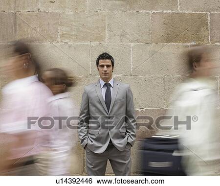 Business man in crowd View Large Photo Image Stock Photograph - Business man in crowd. Fotosearch