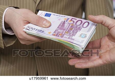 Stock Image - Transferring money-notes. Fotosearch