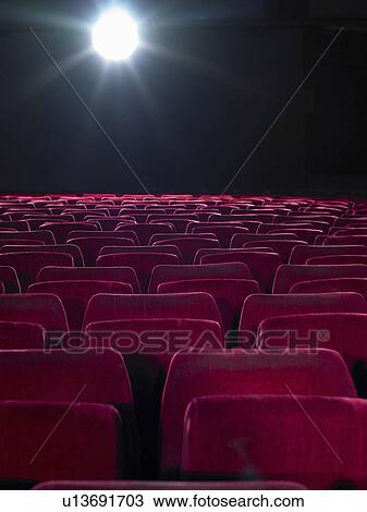 Rows of empty red cinema seats View Large Photo Image Stock Image - Rows of empty red cinema seats. Fotosearch