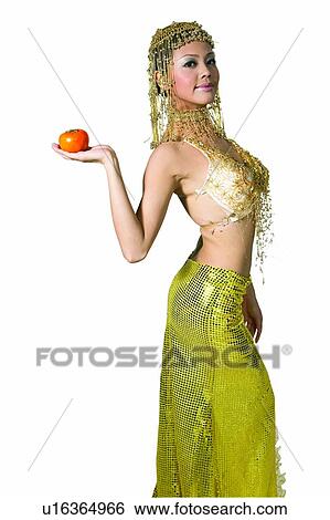 Stock Photograph - One Young Woman Only, Queen, Fashion, One Person, Pomegranate. Fotosearch
