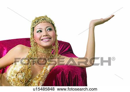Posing, Looking Away, One Person, Indoor, Young Adult, Asian Ethnicity View Large Photo Image Stock Photo - Posing, Looking Away, One Person, Indoor, Young Adult, Asian Ethnicity. Fotosearch