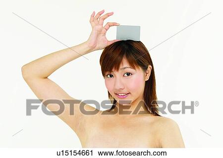Stock Image - Bangs, Brown Hair, Asian Ethnicity. Fotosearch