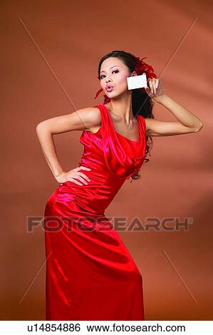 Stock Photograph - Bending, Close-Up, Black Hair, Asian Ethnicity. Fotosearch