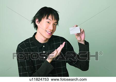 Stock Image - Black Hair, Close-Up, Casual Clothing, Asian Ethnicity. Fotosearch