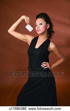 Black Hair, Colored Background, Close-Up, Asian Ethnicity View Large Photo Image Stock Photo - Black Hair, Colored Background, Close-Up, Asian Ethnicity. Fotosearch