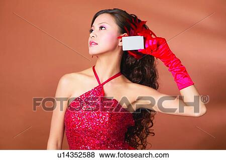Black Hair, Evening Gown, Colored Background, Asian Ethnicity View Large Photo Image Stock Photo - Black Hair, Evening Gown, Colored Background, Asian Ethnicity. Fotosearch