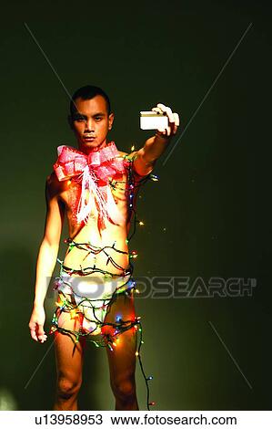Stock Image - Bow, One Young Man Only, Convenience, Looking At Camera. Fotosearch