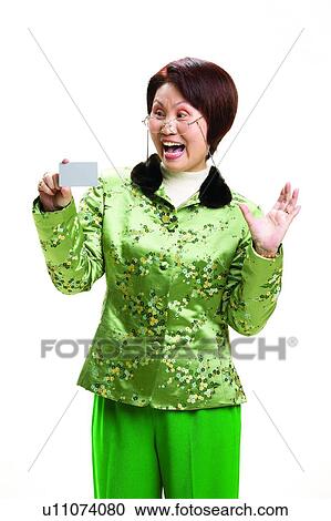 Stock Image - Brown Hair, Close-Up, Casual Clothing, Asian Ethnicity. Fotosearch