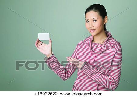 Close-Up, Communication, Show Card, Gesturing, Smiling, One Person View Large Photo Image Stock Image - Close-Up, Communication, Show Card, Gesturing, Smiling, One Person. Fotosearch