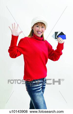 Stock Photo - Lifestyles, Asian Ethnicity, Turtleneck, Hat. Fotosearch