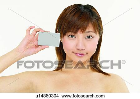 Looking At Camera, Asian Ethnicity, Show Card, Bangs View Large Photo Image Picture - Looking At Camera, Asian Ethnicity, Show Card, Bangs. Fotosearch