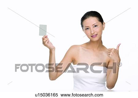 Stock Photography - Looking At Camera, Happiness, One Young Woman Only, Waist-Up, Agreement. Fotosearch
