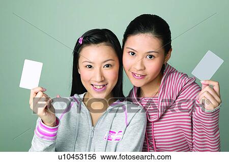 Stock Photograph - Show Card, Toothy Smile, Black Hair, Hair Clip. Fotosearch