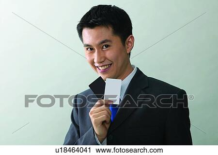 Standing, Indoor, Businessman, Communication, Portrait, Shirt And Tie View Large Photo Image Stock Image - Standing, Indoor, Businessman, Communication, Portrait, Shirt And Tie. Fotosearch