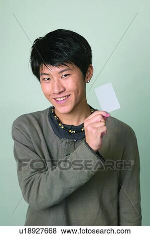 Young Adult, Waist-Up, Asian Ethnicity, Looking At Camera, Casual Clothing View Large Photo Image Stock Photo - Young Adult, Waist-Up, Asian Ethnicity, Looking At Camera, Casual Clothing. Fotosearch