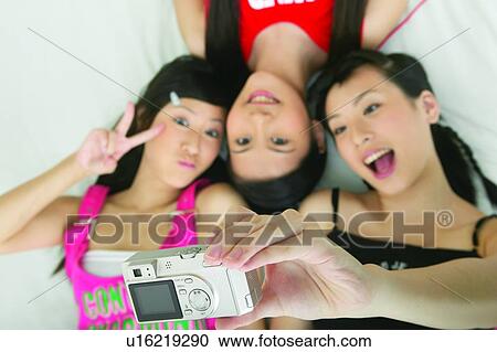 Stock Image - Asian Ethnicity, Chinese Ethnicity, Casual Clothing, Black Hair, Adults Only. Fotosearch