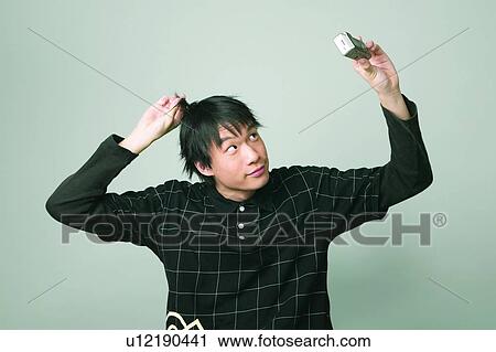 Black Hair, Chinese Ethnicity, Checked, Casual Clothing, Asian Ethnicity View Large Photo Image Stock Image - Black Hair, Chinese Ethnicity, Checked, Casual Clothing, Asian Ethnicity. Fotosearch