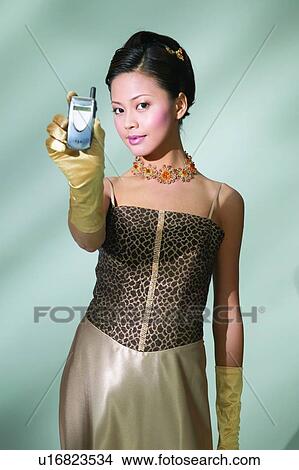 Black Hair, Colored Background, Chinese Ethnicity, Asian Ethnicity View Large Photo Image Picture - Black Hair, Colored Background, Chinese Ethnicity, Asian Ethnicity. Fotosearch