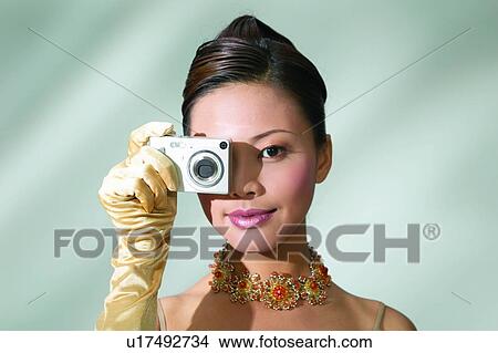 Black Hair, Colored Background, Chinese Ethnicity, Asian Ethnicity View Large Photo Image Picture - Black Hair, Colored Background, Chinese Ethnicity, Asian Ethnicity. Fotosearch