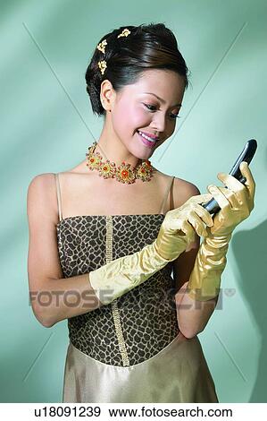 Brown Hair, Colored Background, Chinese Ethnicity, Asian Ethnicity View Large Photo Image Stock Photo - Brown Hair, Colored Background, Chinese Ethnicity, Asian Ethnicity. Fotosearch