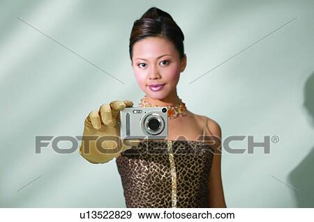 Chinese Ethnicity, Brown Hair, Looking At Camera, Asian Ethnicity, Leisure Activity View Large Photo Image Stock Photo - Chinese Ethnicity, Brown Hair, Looking At Camera, Asian Ethnicity, Leisure Activity. Fotosearch