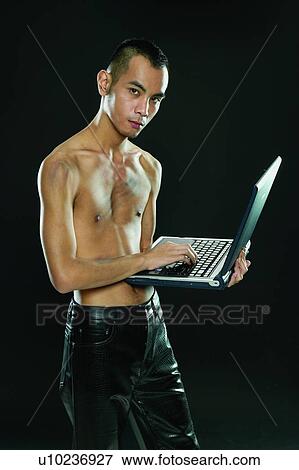 Connection, Technology, Semi-Dress, Indoor, Asian Ethnicity, Wireless Technology, Looking At Camera View Large Photo Image Stock Photo - Connection, Technology, Semi-Dress, Indoor, Asian Ethnicity, Wireless Technology, Looking At Camera. Fotosearch