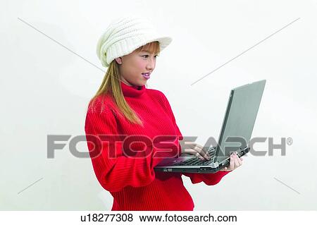 Indoor, Blond Hair, Communication, One Young Woman Only View Large Photo Image Stock Photo - Indoor, Blond Hair, Communication, One Young Woman Only. Fotosearch